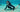 Asian woman snorkeling in clear turquoise tropical water wearing SAILBEE's navy rashguard.