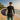 Asian male surfer in SAILBEE 306 rashguard with surfboard.