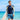 Model wearing the SAILBEE men’s UPF 50+ rash guard on a sunny beach