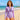 Women's UPF 50+ half-zip long-sleeve rash guard worn on the beach