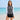 Model wearing the SAILBEE Women's Long-Sleeve Diving & Snorkeling Swim Set on a sunny beach