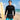 Men's UPF 50+ long-sleeve rash guard set worn on the beach