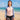 Model wearing the SAILBEE women\'s long-sleeve rash guard swim set on a sunny beach