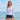 Model wearing the SAILBEE Women's Long-Sleeve Rash Guard Swim Set N106 on a sunny beach